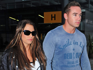 Katie Price and new husband Kieran Hayler arrive at Heathrow airport after flying back from their honeymoonFeaturing: Katie Price aka Jordan,Kieran Hayler
Where: London, Heathrow, England
When: 20 Jan 2013
Credit: WENN.com