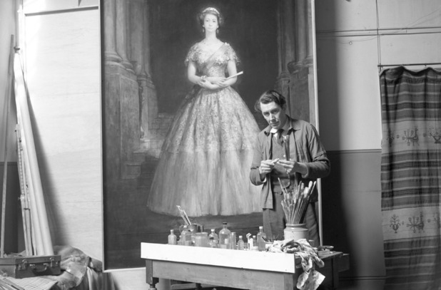 John Napper in his studio based in Chelsea, London, with his life-size portrait of the Queen, which was commissioned for Liverpool Town Hall