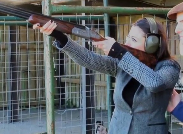Melanie Sykes trying her hand at clay pigeon shooting with Peter Wilson.