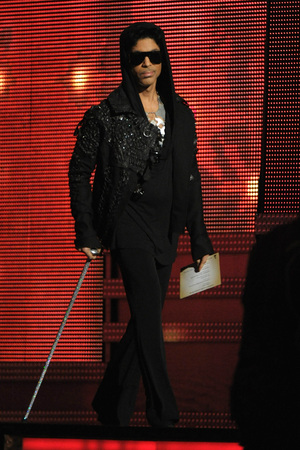 Prince makes a surprise appearance at the 2013 Grammy Awards