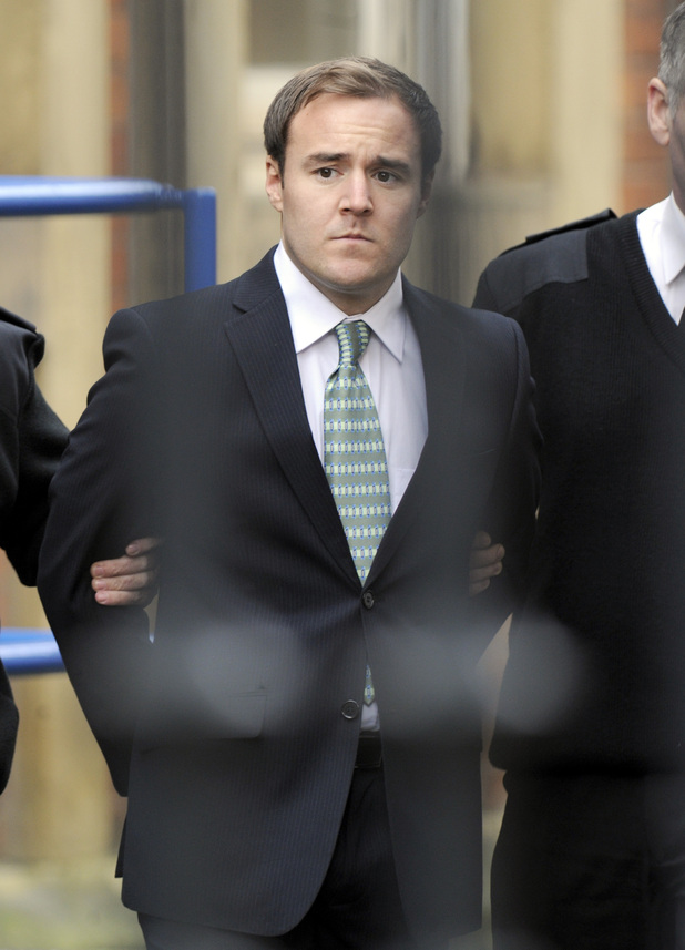A handcuffed Tyrone is escorted by prison officers