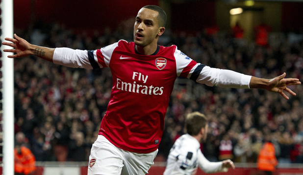 Arsenal's Theo Walcott celebrates after scoring the opening goal against Newcastle United during their English Premier League soccer match at the Emirates stadium, London, Saturday, Dec. 29, 2012.