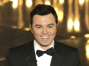 Seth MacFarlane on stage at the 2013 Oscars