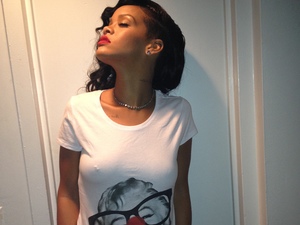 Rihanna wears Red Nose Day shirt.