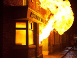 8085: An explosion sends flames throughout the Rovers as residents approach in a state of panic