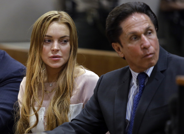 Lindsay Lohan with her lawyer Mark Heller at Los Angeles County Superior Court - March 18, 2013