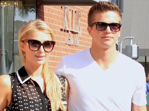 Paris Hilton and her boyfriend River Viiperi walking on Bedford Drive
