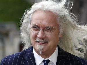 Billy Connolly arrives for a reception for the British Film Industry held by Britain's Queen Elizabeth II and The Duke of Edinburgh at Windsor Castle