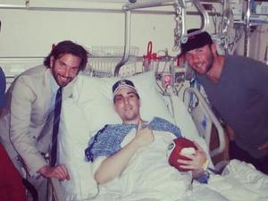 Bradley Cooper and Julian Edelman visit Boston survivor Jeff Bauman