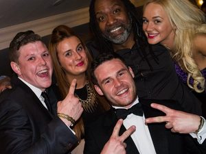 Reginald D Hunter poses for photos after the PFA awards