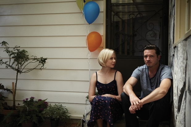 'Rectify' still: Tawney Talbot (Adelaide Clemens) and Daniel Holden (Aden Young) with balloons on porch