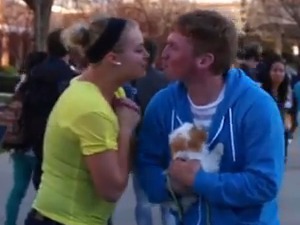 Man receives kisses for cute puppy