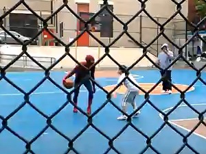 'Amazing Spider-Man' Andrew Garfield plays basketball with children