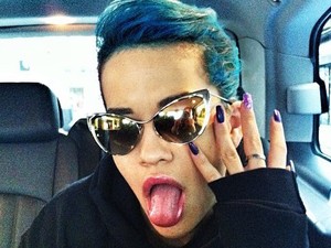 Rita Ora models her new blue hair