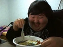 Korean man giggling