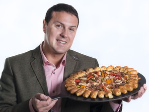 Paddy McGuinness with a Pizza Hut pizza