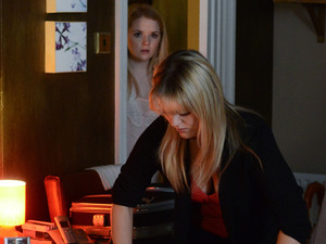 Abi walks in on Tanya packing her suitcase.