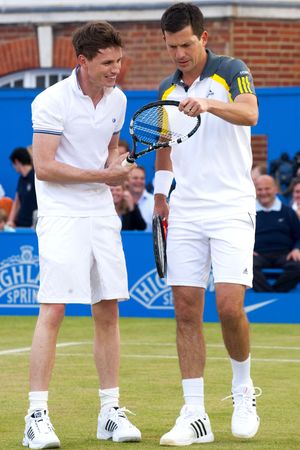 Eddie Redmayne and Tim Henman take part in Rally Against Cancer at the Queen's Club, London
