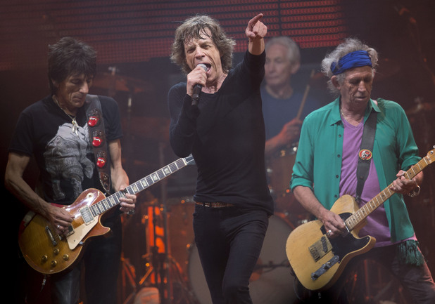 Mick Jagger, Ronnie Wood, Charlie Watts, and Keith Richards of the Rolling Stones, perform on the Pyramid main stage at Glastonbury.