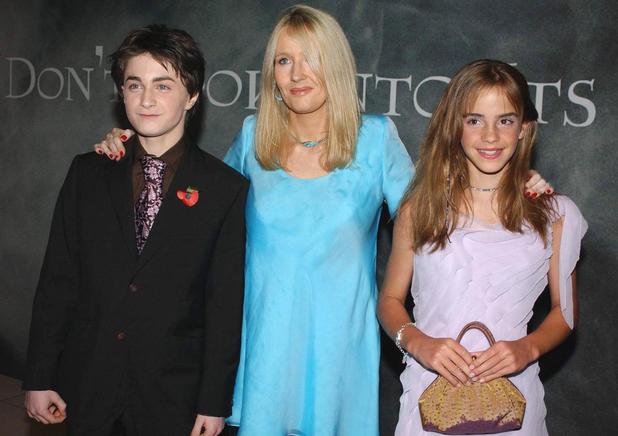 Daniel Radcliffe, who plays Harry Potter (left) with the characters creator JK Rowling (centre) and co-star Emma Watson as they arrive for the celebrity film premiere of Harry Potter and the Chamber of Secrets at the Odeon Leicester Square
