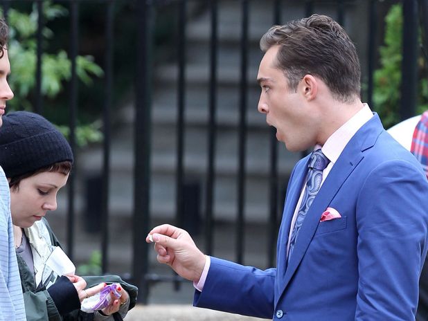 'Gossip Girl' on set filming, New York, America - 16 Aug 2011 Ed Westwick handing his gum to a make-up assistant