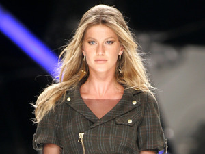 Top model Gisele Bundchen wears part of the Colcci fall-winter fashion collection