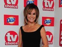 Holden tells DS she is "thrilled" by both her return to the show and Simon Cowell's baby joy.