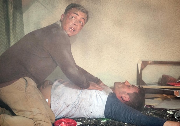 Dennis tries to revive Darren.