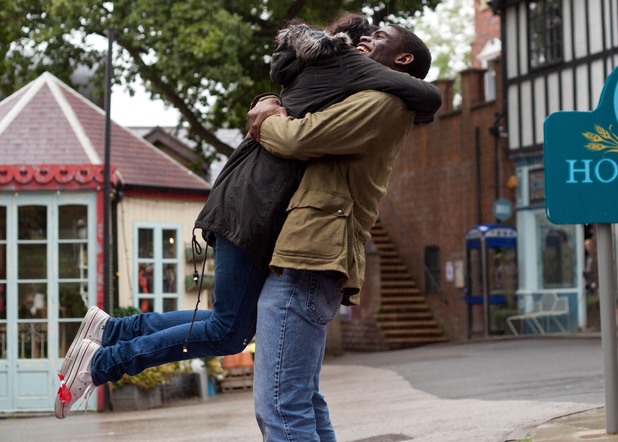 Vincent sweeps Phoebe off her feet.