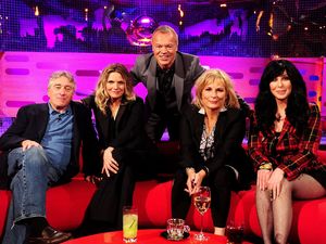 Graham Norton poses with Robert De Niro, Michelle Pfeiffer, Jennifer Saunders and Cher during filming for the Graham Norton Show at The London Studios