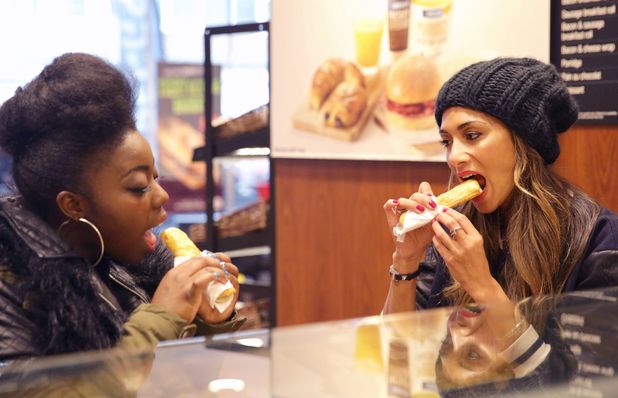 Nicole Scherzinger and Hannah Barrett eat sausage rolls together