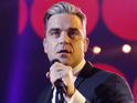 The singer's long-time collaborator Guy Chambers also stars in the clip.