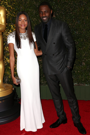 HOLLYWOOD, CA - NOVEMBER 16: Naomie Harris, Idris Elba arrives at the Academy of Motion Picture Arts and Sciences' Governors Awards at The Ray Dolby Ballroom at Hollywood & Highland Center on November 16, 2013 in Hollywood, California.