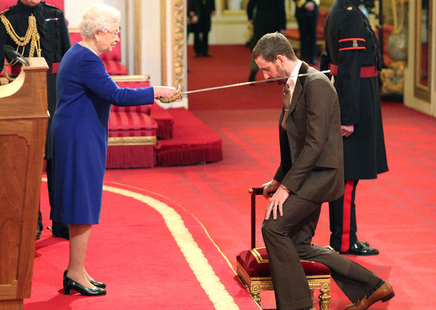 ... Bradley Wiggins is knighted by Queen Elizabeth II at Buckingham Palace