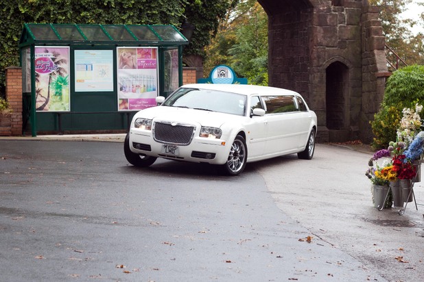 A limo pulls up in the village