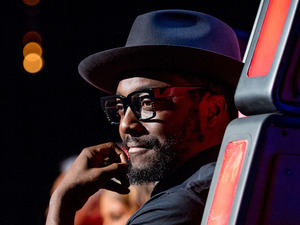 will.i.am smiles during The Voice UK's third series premiere