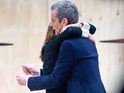 Jenna Coleman hugs Peter Capaldi's Time Lord as filming continues on series 8.