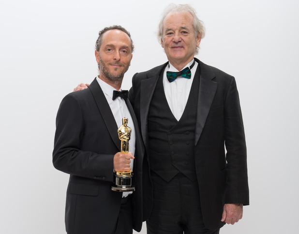 A.M.P.A.S. After winning the category Achievement in cinematography for work done on "Gravity", cinematographer Emmanuel Lubezki poses backstage with his Oscar® and Bill Murray
2 Mar 2014