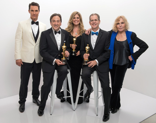 A.M.P.A.S. After winning the category Best animated feature film of the year for work in "Frozen," Peter Del Vecho, Jennifer Lee, and Chris Buck pose with their Oscars®, Matthew McConaughey, and Kim Novak