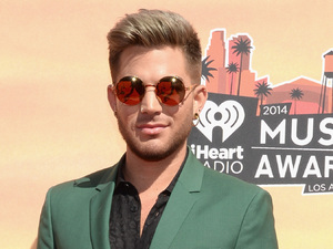 LOS ANGELES, CA - MAY 01: iHEARTRADIO MUSIC AWARDS -- Pictured: Singer Adam Lambert arrives at the iHeartRadio Music Awards held at the Shrine Auditorium on May 1, 2014. (Photo by Larry Busacca/NBC/NBCU Photo Bank)