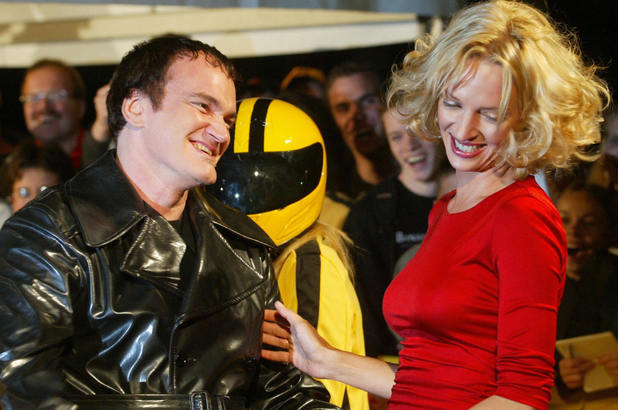 US actress Uma Thurman (R) and director Quentin Tarantino arrive for the German premiere of Tarantino's film 'Kill Bill: Volume 1' in which Thurman stars, in Berlin 01 October 2003. AFP PHOTO DDP/JOHANNES EISELE GERMANY OUT (Photo credit should read JOHANNES EISELE/AFP/Getty Images)