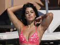 See stars of the reality TV show posing by the pool as filming begins.