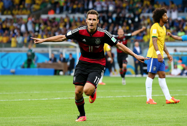Miroslav Klose of Germany celebrates scoring his team's second goal during the 2014 FIFA World Cup semi-final match against Brazil