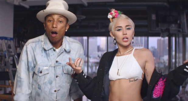 Pharrell Williams and Miley Cyrus in 'Come Get It Bae' music video.