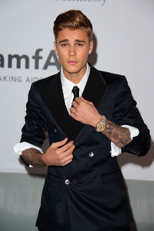 CAP D'ANTIBES, FRANCE - MAY 22: Justin Bieber attends amfAR's 21st Cinema Against AIDS Gala, Presented By WORLDVIEW, BOLD FILMS, And BVLGARI at the 67th Annual Cannes Film Festival on May 22, 2014 in Cap d'Antibes, France. (Photo by Mike Marsland/WireImage)