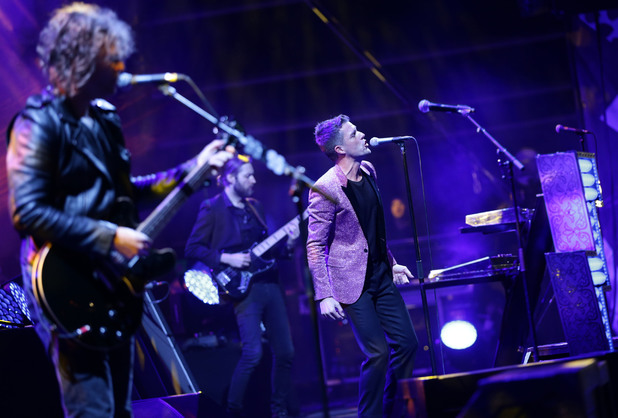 Brandon Flowers of The Killers performing on the Main Stage during day two of the V Festival, at Hylands Park in Chelmsford, Essex.