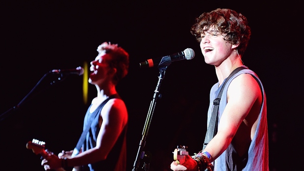James McVey and Bradley Simpson of The Vamps performs at Hammersmith Apollo on October 14, 2014 in London, England
