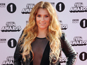 Ella Henderson celebrates selling over one million copies of 'Ghost' in America.
