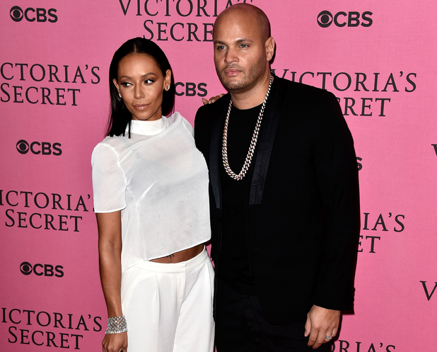 LONDON, ENGLAND - DECEMBER 02: Melanie Brown and Stephen Belafonte attend the annual Victoria's Secret fashion show at Earls Court on December 2, 2014 in London, England. (Photo by Pascal Le Segretain/Getty Images)