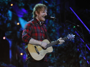 Ed Sheeran performing at the BBC Music Awards 2014